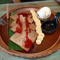 Pancakes with fruit and vanilla ice cream at Mango in Bangkok