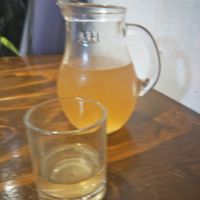 Take some ginger Kombucha shot! at Mango in Bangkok