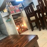 Always an altar in the really genuine Thai places.. at Mango in Bangkok