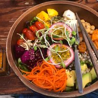Delicious Buddha bowl with passion fruit in the middle at Mango in Bangkok