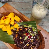 Black rice with mango and a kombucha mocktail. at Mango in Bangkok