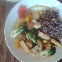mixed veggies with tempeh, rice separate at Mango in Bangkok