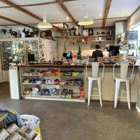 The counter has a friendly server, all the convenience store candy and gum, but also baked goods from New Day Eatery, coffee, tea.  Fresh sandwiches are premade in a refrigerator.  at Lincoln Park Grocery in Port Angeles