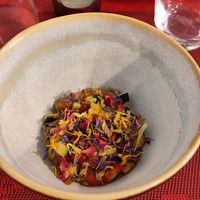 Amuse Bouche - nuts, fruits and vinegar garnished with flowers at So Dream in La Rochelle