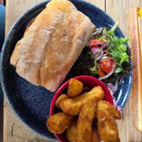 Vegan burger (in a ciabatta roll, not brioche) with chips at Periwinkle Bistro in Wales