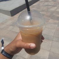 Caramel iced coffee with oat milk at Restaurante Las Arenas in Ibiza