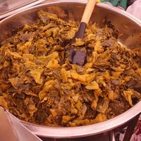 Collard greens with onions, garlic, ginger and spices at Ethiopian Vegan Eats in East London