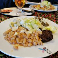 Burger, cannellini, artichoke salad and creamy lentils at Kamilou in Brussels