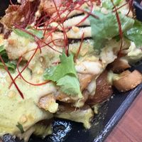 Loaded potatoes!!! Our favorite dish!! My mom would be so mad at me for filling up on potatoes at a fancy restaurant but WORTH IT  at Tane Vegan Izakaya - Highland Park in Los Angeles