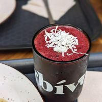 Red berry "milkshake". More or less just a smoothie at Herbívoro -  Av. Suba in Bogota