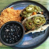 Sweet potato tacos on soft corn shells.  Ask for no cheese, and sub the refried beans to black beans.  Delicious and filling! at Gorilla Taco in Pigeon Forge
