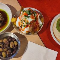 Left to right; Jerusalem artichokes, olives, potatoes and falafels. Two of us were very full after this but they let us take leftovers away in our own tupaware box. at Dust Kitchen in Gdansk