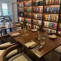 Seating and book case  at Elaine's  in Alexandria