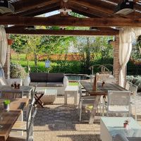 Patio at Fattoria I Canarini in Fossalta Di Piave