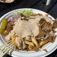 Kebab plate with fries, salad and vegan sauce.  at Hamngrillen in Västra Götalands Län