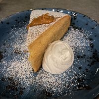 Traditional mallorcan almond cake with caramel sauce and amaretto whipped cream   at Villa Vegana in Mallorca