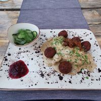 Main course: Kötbullar: Vegan meatballs with
creamy mushroom marsala sauce, served with mashed potatoes, cucumber salad and lingonberry yam at Villa Vegana in Mallorca