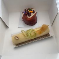 Yuzu mousse with cherries 
Rhubarb pastry with oat and soy cream on an almond oat granola at Le Fournil de La Butte in Plouider