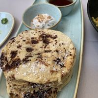 Chocolate chip pancakes with coconut whipped cream and oozy syrup at Equinox Restaurant in Washington