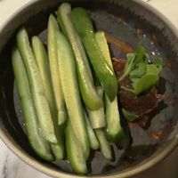 I ordered the cucumbers specifically for the soybean paste that came along side them.. strong miso type pastes were common when I lived in Korea and I totally miss it.   Delicious! at Whisky & Ramen in Anchorage