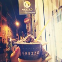 chocolate gelato with sign outside at Grezzo Raw Chocolate in Rome