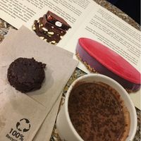 Hot chocolate with raw cocoa cookie at Grezzo Raw Chocolate in Rome