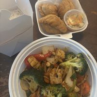 Curry puff, Szechuan Tofu, free side of ricee  at Thai Corner Cuisine in St Charles