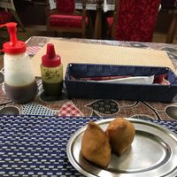 Appetizer fresh samosa with green and tamarind chutneys at Kusum Indian Restaurant in Kobe