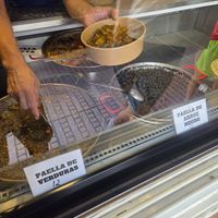 The vegetable Paella is on the left, served into good sized serving boxes! at Doña Paella en Ibiza in Ibiza