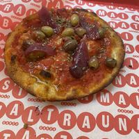 Pizzetta rosa with olives and onions   at Pizzeria al taglio Ganza - Mai Abbastanza in Florence