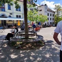 Public seating opposite at Gelateria di Berna - Röschibachplatz in Zurich