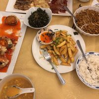 Mixed meat platter (top), sweet and sour “yellow” fish (left), crispy seaweed, salt and pepper chips, stir fried noodles, chicken and sweetcorn soup (bottom left) boiled rice.  at Hey Hey Vegan Cuisine in Sale