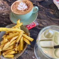 iced matcha with oat milk, cappuccino with oat milk, fries at Flora Coffee & Florist in Portsmouth