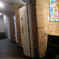 Toilets at start of basement area at Club Mexicana in West London