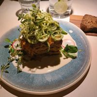 Vegan lasagna with some bread. at Vegan Restoran V in Tallinn