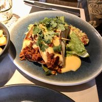 pommes frites with cheese sauce  at Vegan Restoran V in Tallinn