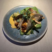 Spicy oven-baked seitan tacos with sheese and guacamole  at Vegan Restoran V in Tallinn