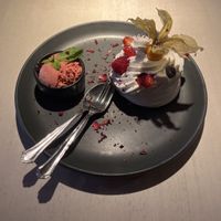 Meringue with passion fruit filling and vegan strawberry ice cream  at Vegan Restoran V in Tallinn