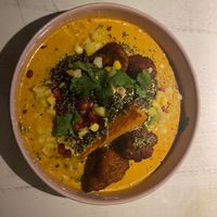 Lightly spicy oven-roasted sweet potato with breaded cauliflower, quinoa and  coconut-tomato saucE at Vegan Restoran V in Tallinn