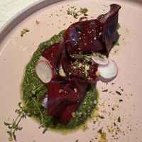 Beetroot ravioli with a cashew filling and green pesto! 10/10!!!  at Vegan Restoran V in Tallinn