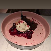 Brownie with white chocolate ice cream, cherry sauce and hazelnut crisp at Vegan Restoran V in Tallinn