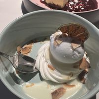 Pavlova with lime cream and coconut ice cream   at Vegan Restoran V in Tallinn