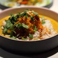 Peanut curry with breaded cauliflower, chilli sauce and cucumber-carrot salad at Vegan Restoran V in Tallinn
