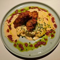 Mati's breaded chickenless fillet with herb sheese, potato puree and sun-dried tomato sauce at Vegan Restoran V in Tallinn