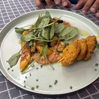 Spicy skewers on tasty Muhammara  at Vegan Restoran V in Tallinn