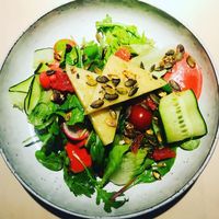 Light salad with raspberry vinaigrette and halloumi cheez at Vegan Restoran V in Tallinn