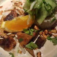 Tempeh with brown basmati rice and coconut-peanut sauce at Vegan Restoran V in Tallinn