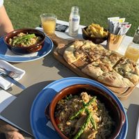Vegan surprise bowls and focaccia bread  at CALA Melide in Lugano