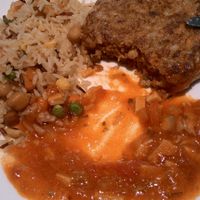 Veggie burguer (veggies and texturized soy) with tomato with soy, and rice with soy, beans and chickpeas. at Tast i mes Natural in Barcelona