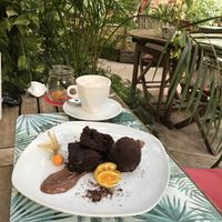 Vegan Brownie and homemade chai Latte  at Temple Natura in Mallorca